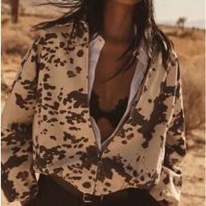 Pilcro by Anthropologie cow print bomber jacket .